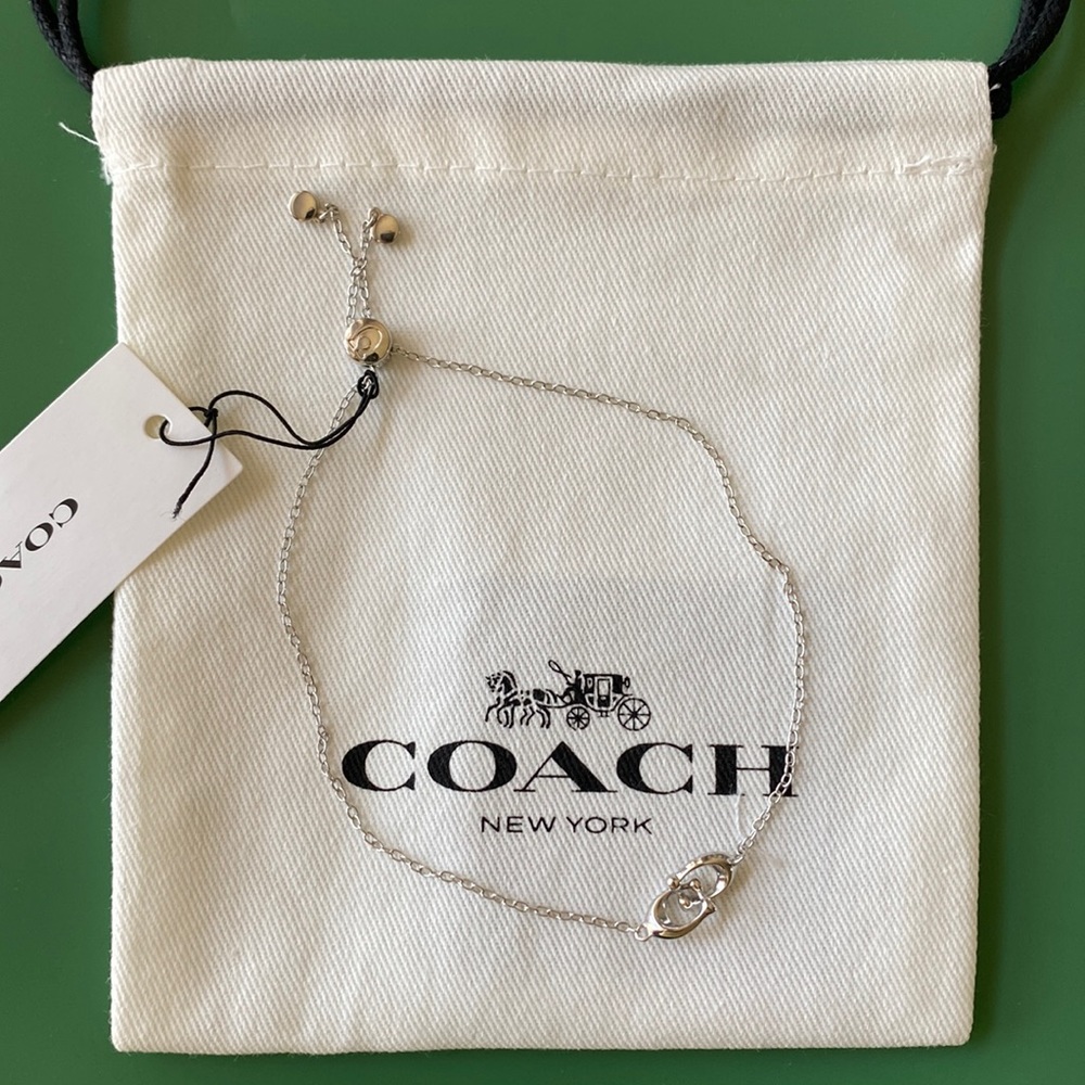 Coach interlocking C slider bracelet.